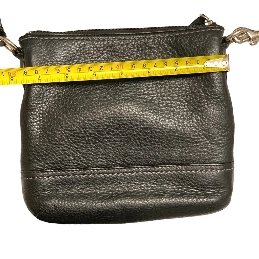 Coach black pebbled leather turnlock swingpack crossbody bag